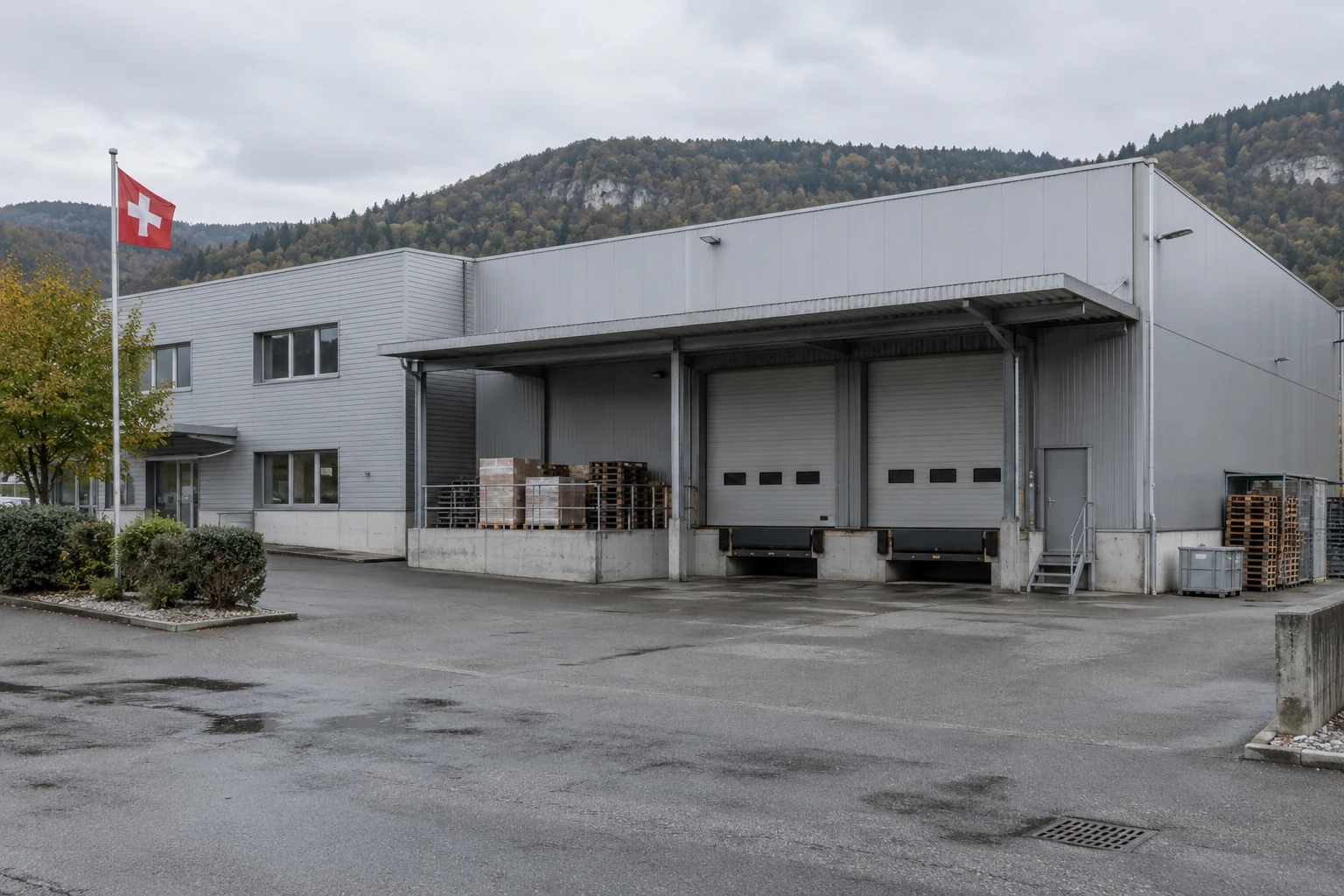 Illustration of an industrial depot in a Swiss Jura setting, with loading bays and a Swiss flag